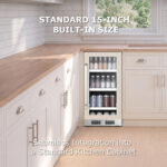Beverage refrigerator with a stainless steel handle installed flush under a wooden kitchen countertop between white cabinets, highlighting its standard 15-inch built-in size.